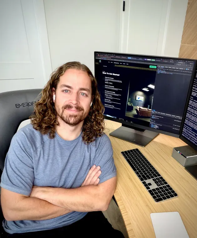 Max Jacobson working on code at his desk