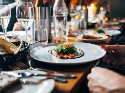 Plated dish at a restaurant table with warm ambient lighting