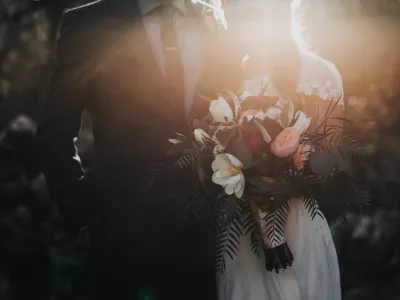 Bride and groom standing together during their wedding ceremony