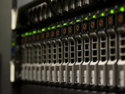 Server rack with network cables and indicator lights in a data center