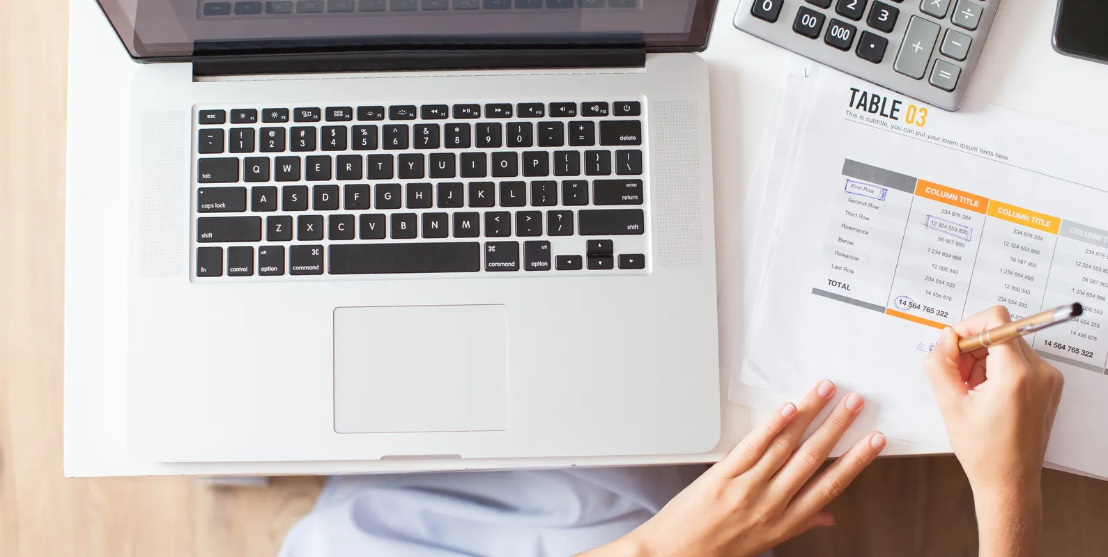 Woman reviewing documents and costs at her desk